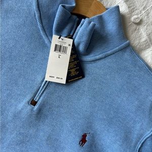 Never worn polo sweater. 1/4 zip